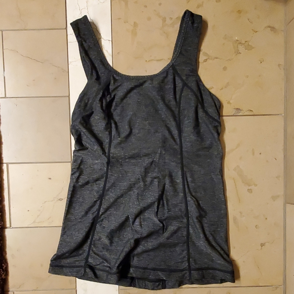 Dark gray tank top with ruffle details